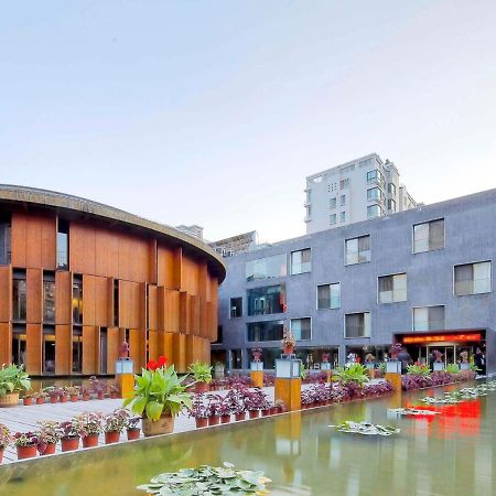 China Community Culture & Art Hotel Qingdao Extérieur photo